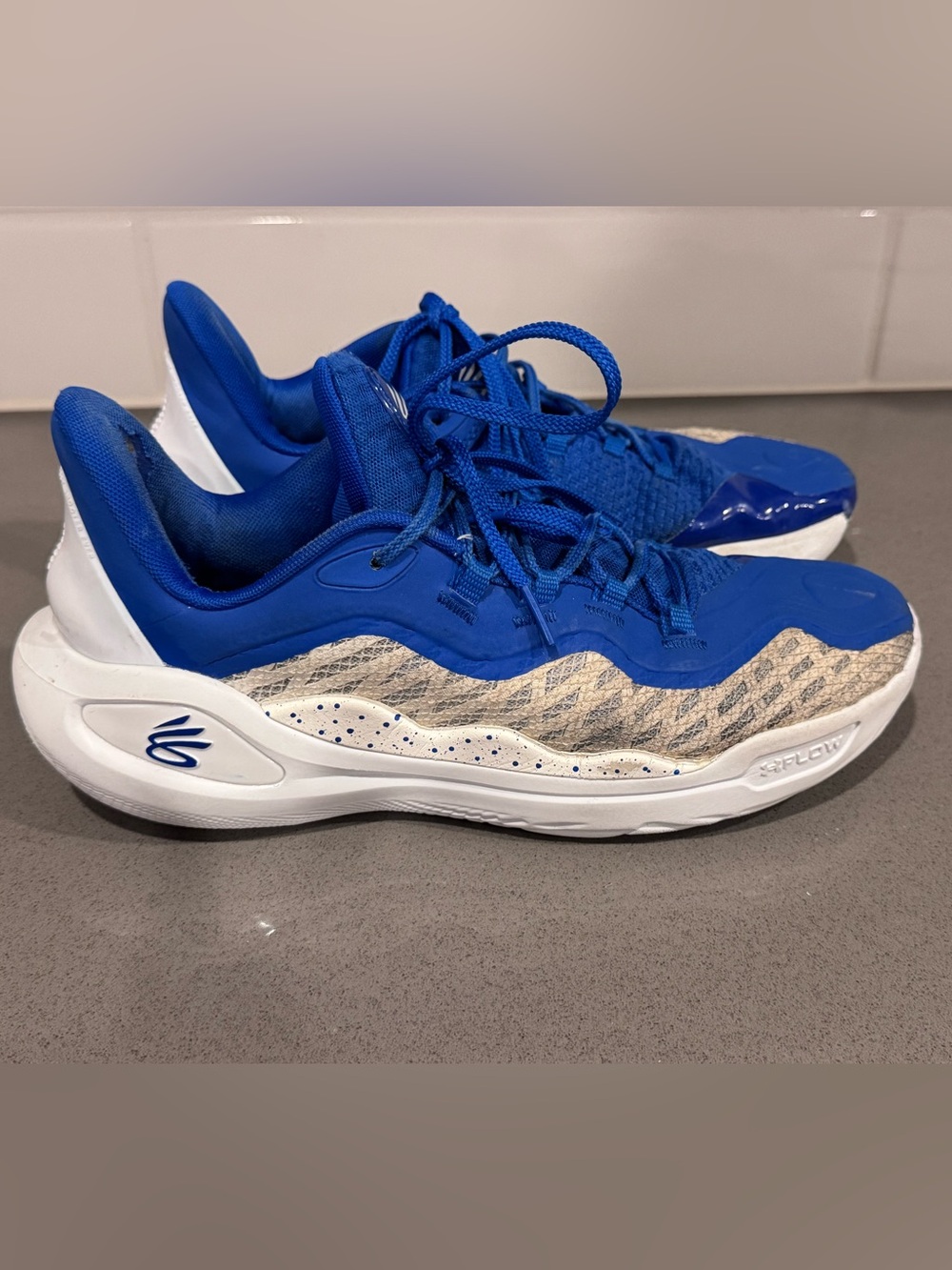 Under Armour Curry 11 'White Team Royal' basketball shoes.